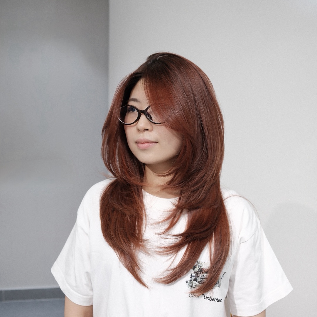 Mẫu tóc layer nhuộm nâu đỏ tại The New's Hair