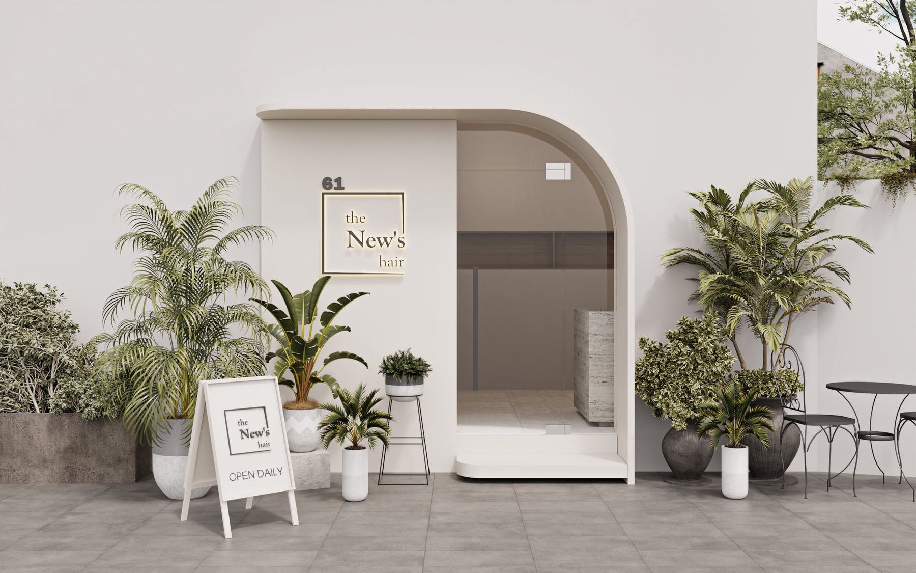 Mặt tiền salon The New's Hair tại 61 Trần Quốc Thảo — cửa vòm trắng, biển hiệu đèn và cây xanh hai bên